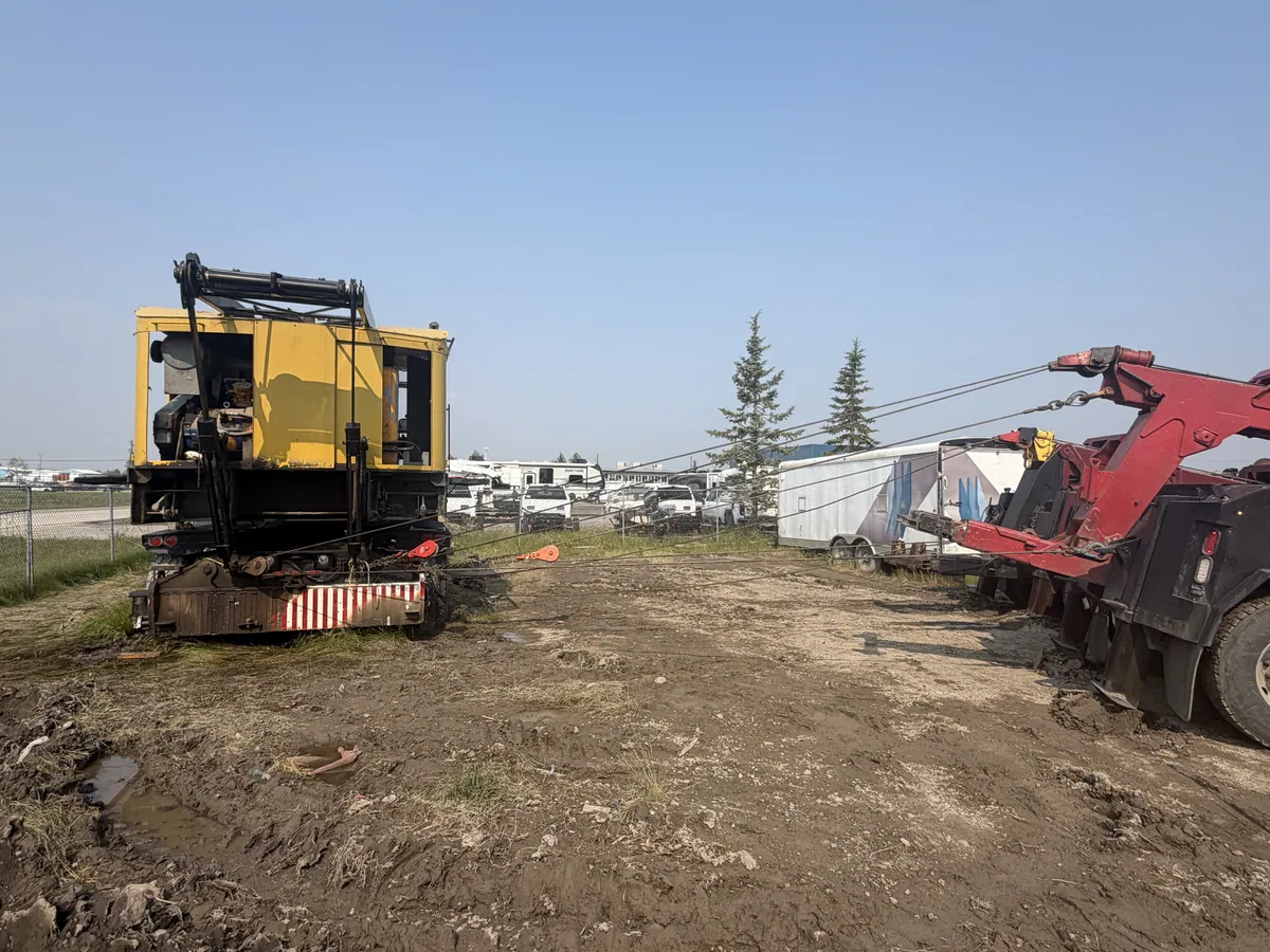 Heavy wrecker recovering equipment off the shoulder